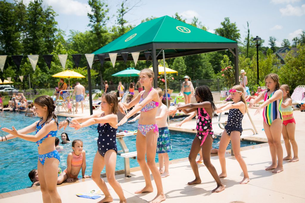 Kids Dancing By The Pool