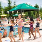 Kids Dancing By The Pool