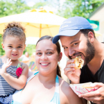 Family Eating From Food Truck